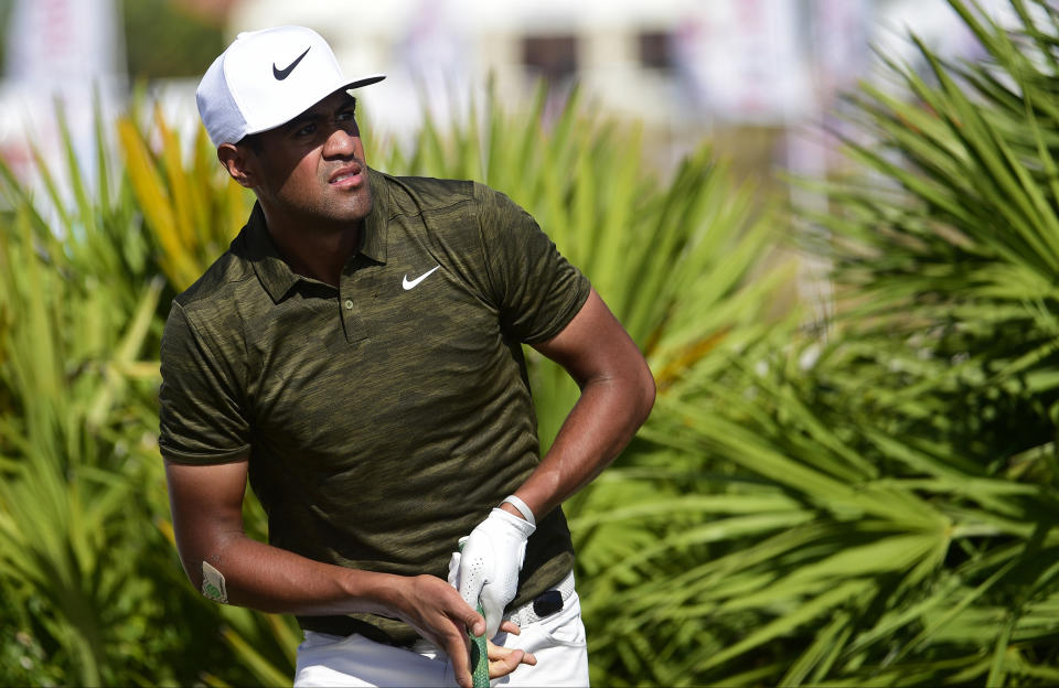 U.S. golfer Tony Finau watches after hitting from the fourth tee during the last round of the Hero World Challenge at Albany Golf Club in Nassau, Bahamas, Sunday, Dec. 2, 2018. (AP Photo/Dante Carrer)