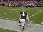 Cleveland Browns placekicker Phil Dawson watches the final seconds of a 25-15 loss to the Baltimore Ravens in an NFL football game on Sunday, Nov. 4, 2012, in Cleveland. Dawson kicked five field goals to account for all of the Browns' points. (AP Photo/Tony Dejak)