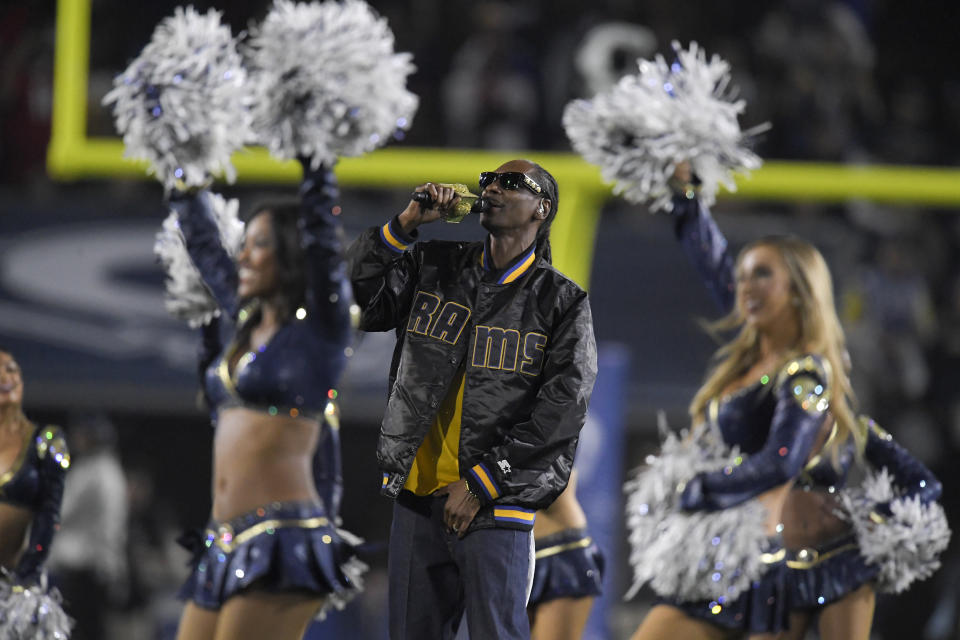 Snoop Dogg is one of the many celebrities who has become a part of the scene at Rams games. (AP)