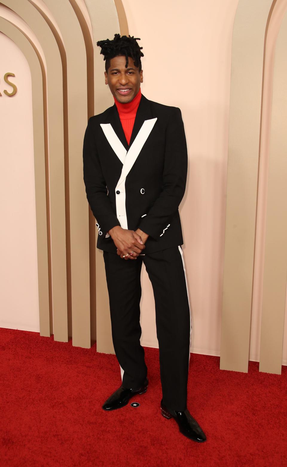 Jon Batiste, seen here arriving at the Oscar nominees luncheon, will perform at the Academy Awards.