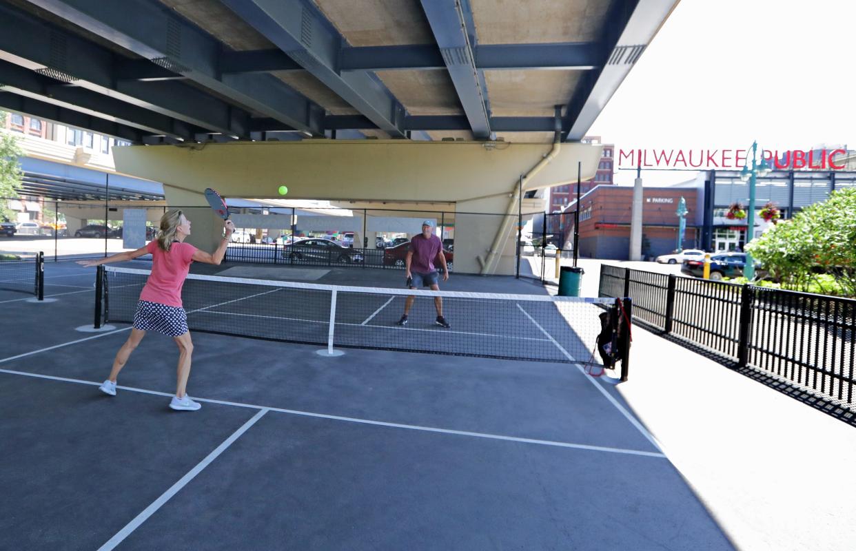 Pickleball courts added beneath Interstate 794 have helped better connect the Historic Third Ward to downtown. Third Ward business operators worry that removing the freeway could bring increased neighborhood traffic.