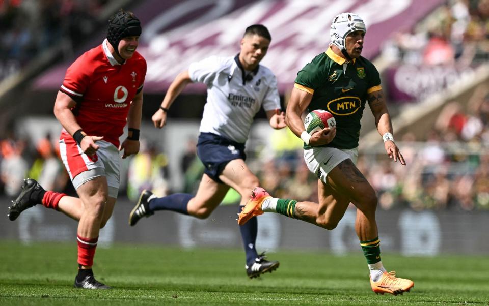 van der Merwe runs out of reach of Welsh defenders to score his debut try