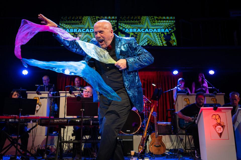 Randy Doyle in a magic moment from "Muskrat Love" at Cotuit Center for the Arts.