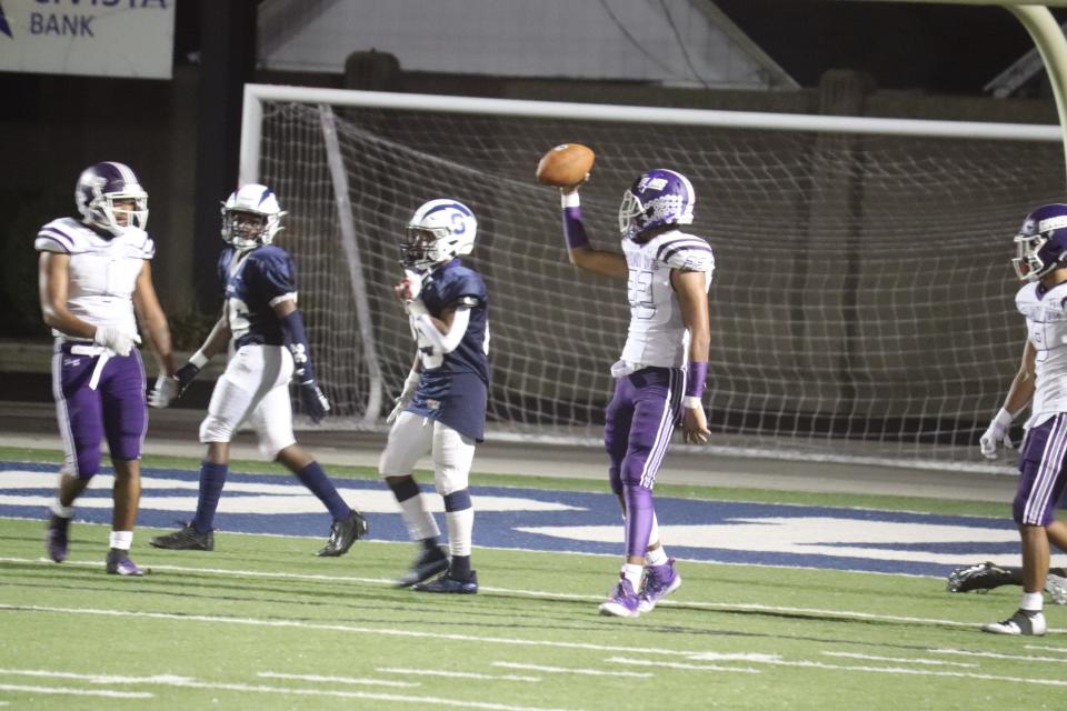 Ross' Anthony Vann looks for an official after his interception.