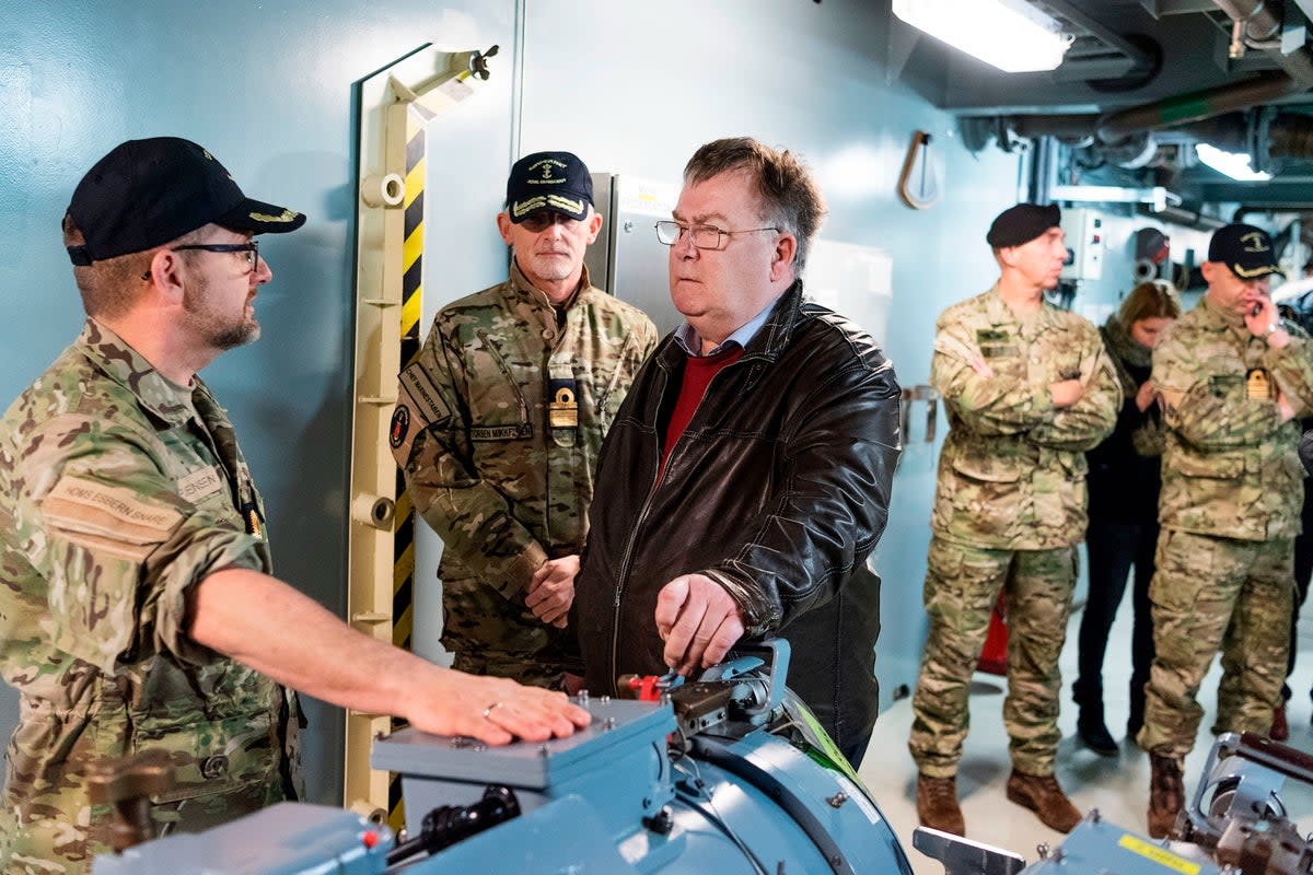 Claus Hjort Frederiksen meets crew on the Danish warship Esbern Snare during his time as defence minister (AFP via Getty Images)