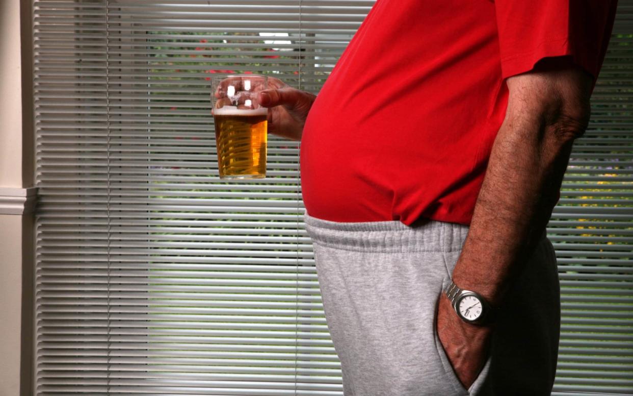 Researchers found excessive boozing into older age was linked to a 1.5 inch larger waist and increased risk of a stroke in men -  GSO Images