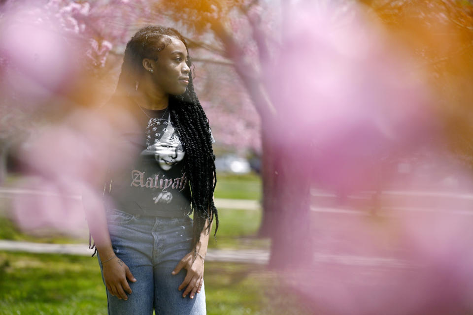 Ashnaelle Bijoux poses on campus, Saturday, April 27, 2024, at Norwich Free Academy in Norwich, Conn. Bijoux, a senior at NFA, has been unable to complete the FAFSA form due to a glitch with the form. Without the form and the financial aid it brings, Bijoux won't be able to pursue her goal of going to Southern Connecticut State University to become a therapist. (AP Photo/Jessica Hill)