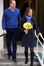 <p><em>December 6, 2012 —</em> After being treated for morning sickness for her first pregnancy, Kate left the King Edward VII Hospital looking cozy in a navy Diane von Furstenberg coat, blue scarf, and tall black boots.</p>