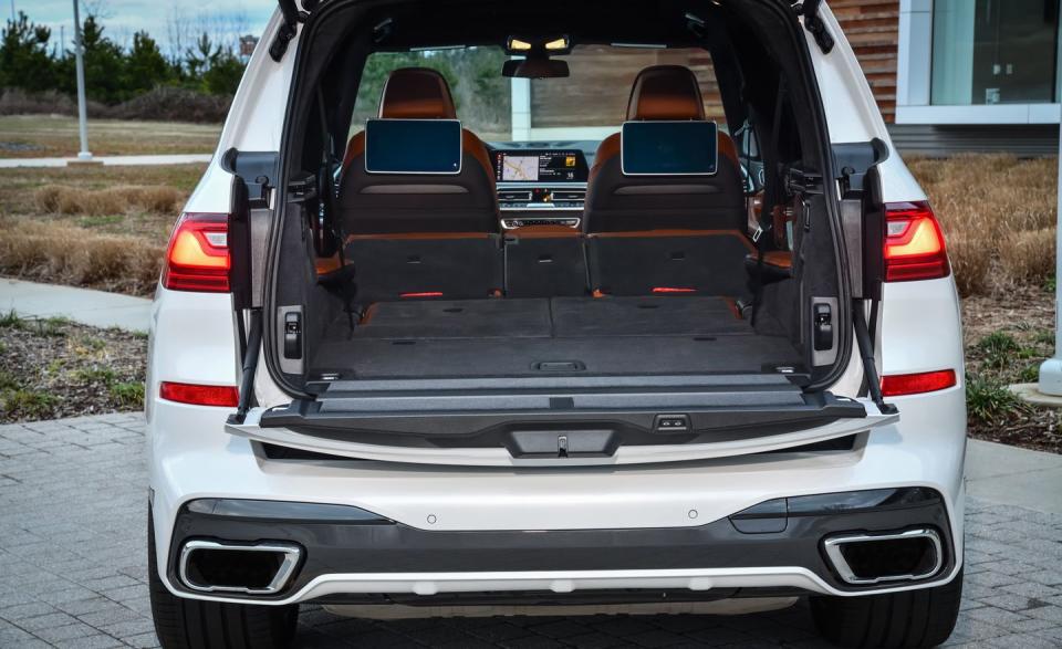 <p>Both the X7's second and third rows can be power folded or raised with the push of a button in the cargo area. </p>