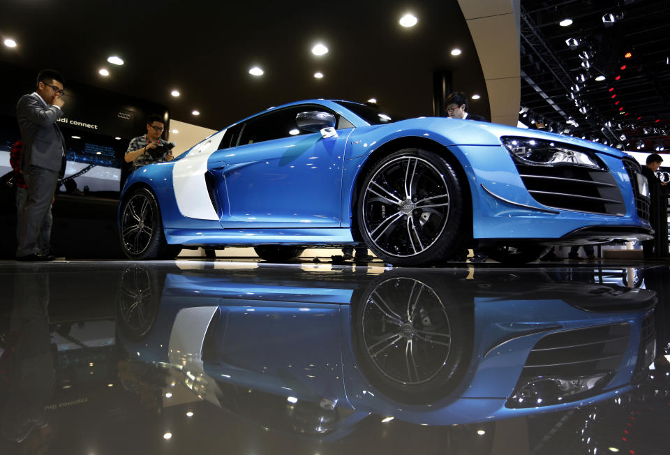 An Audi R8 China Edition sports car is displayed at the company's booth during the Guangzhou Auto Show in China's southern city of Guangzhou Thursday, Nov. 22, 2012. China's second largest auto show kicked off Thursday. (AP Photo/Vincent Yu)
