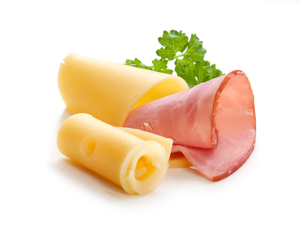 Rolled cheese and ham with fresh green parsley