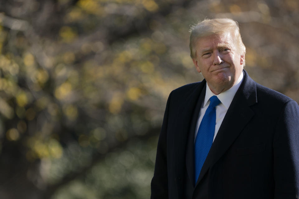 President Donald Trump walks on the South Lawn of the White House in Washington, Sunday, Nov. 29, 2020, after stepping off Marine One. Trump is returning from Camp David. (AP Photo/Patrick Semansky)