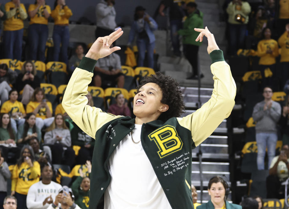 Former Baylor University legend and WNBA star Brittney Griner waves to the crowd during her No. 42 jersey retirement ceremony before an NCAA college basketball game against Texas Tech, Sunday, Feb. 18, 2024, in Waco, Texas. (Rod Aydelotte/Waco Tribune-Herald via AP)