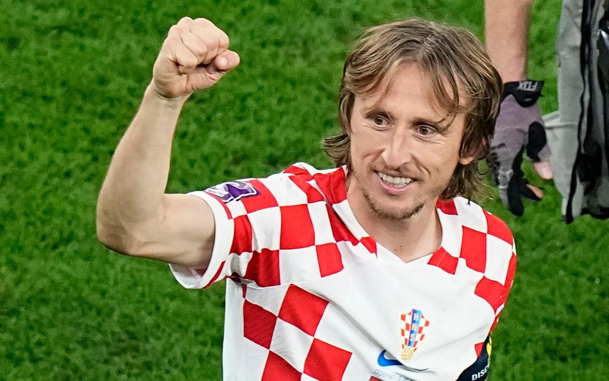 Croatia's Luka Modric celebrates after the World Cup quarterfinal soccer match between Croatia and Brazil, at the Education City Stadium in Al Rayyan, Qatar, Friday, Dec. 9, 2022. - AP Photo/Pavel Golovkin