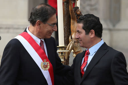 Peru's President Martin Vizcarra and new Justice Minister Salvador Heresi attend a swearing-in ceremony at the government palace in Lima, Peru April 2, 2018. REUTERS/Guadalupe Pardo