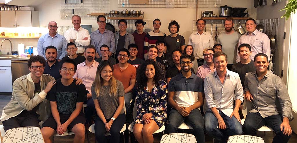  EDO’s staff at an all-hands meeting, including founder Edward Norton (bottom row, second from r.) and CEO Kevin Krim (bottom row, far r.).  