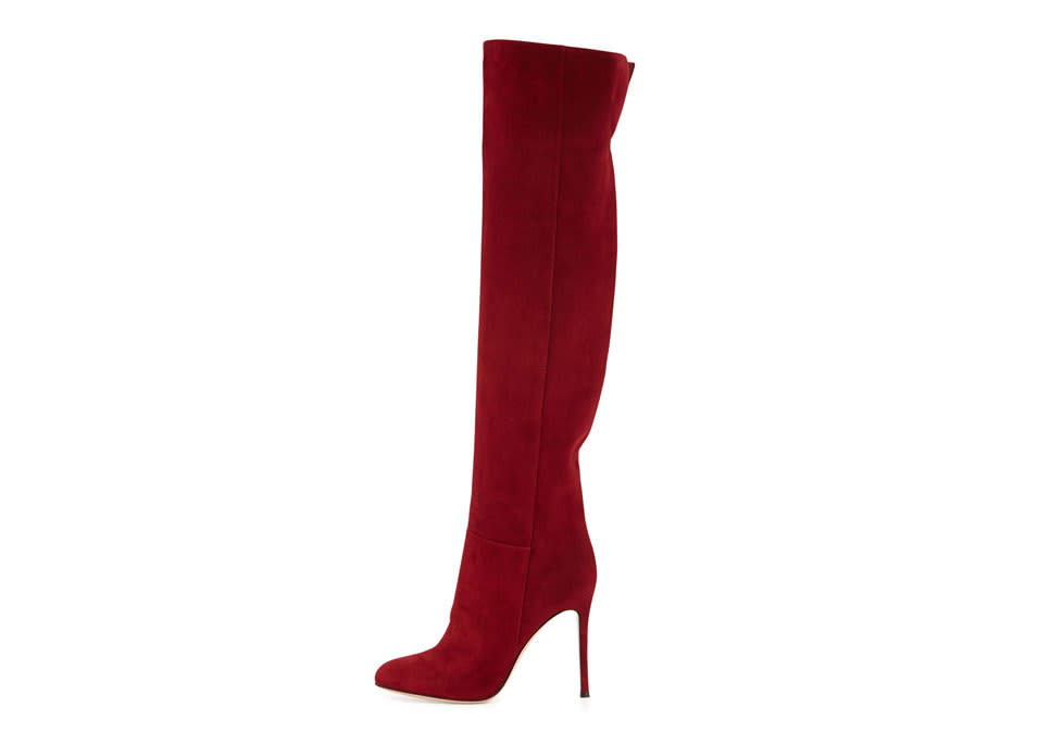 Gianvito Rossi’s cherry-red over-knee boots look just right peeking out of a pencil skirt.