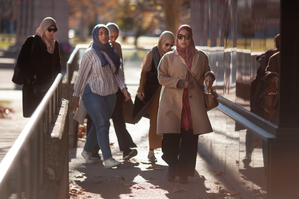 Members of the Muslim community arrive at Superior Court as the Nathaniel Veltman murder trial begins to wrap up, Tuesday, November 14, 2023.