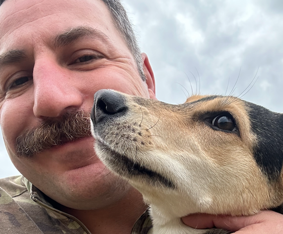 Jared Bertagnolli, a U.S. Army soldier from Pueblo, with his rescued Transylvanian hound Racha
