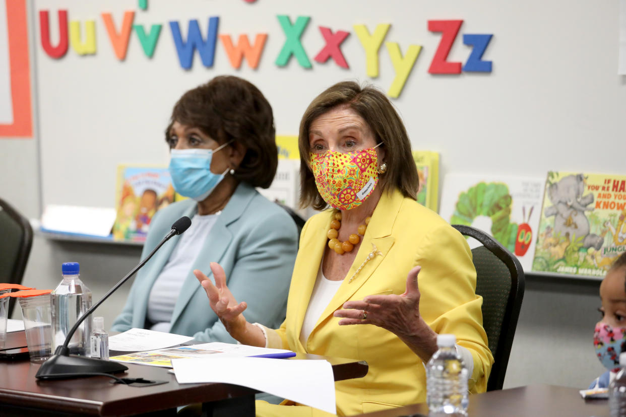 LOS ANGELES, CA - AUGUST 12: House Speaker Nancy Pelosi, right, D-San Francisco, shown with Rep. Maxine Waters, D-Los Angeles, hold a news conference to discuss the importance of the Child Tax Credit at the Ethel Bradley Early Education Center Thursday, Aug. 12, 2021 in Los Angeles, CA. (Gary Coronado / Los Angeles Times via Getty Images)