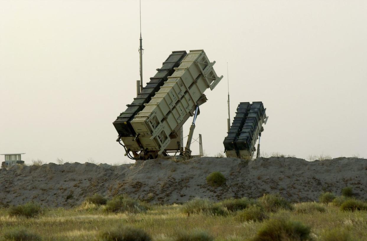 patriot anti missile missiles are aimed skyward at a base ne