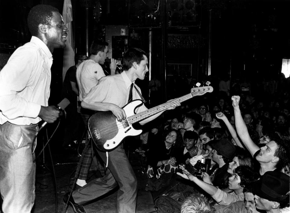 A band performs onstage in the late '70s