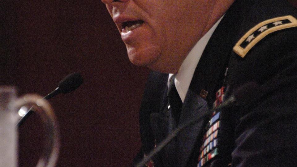 Lt. Gen. Benjamin C. Freakley, commanding general for the U.S. Army Accessions Command, Fort Knox, Ky., speaks at the Coaches Clinic in the Grand Hyatt in San Antonio during the 2012 U.S. Army All American Bowl week. (Sgt. 1st Class Scott Turner/Army)