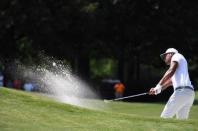 Jun 8, 2018; Memphis, TN, USA; Tony Finau hits out of the sand on the 8th hole during the second round of the FedEx St. Jude Classic golf tournament at TPC Southwind. Christopher Hanewinckel-USA TODAY Sports