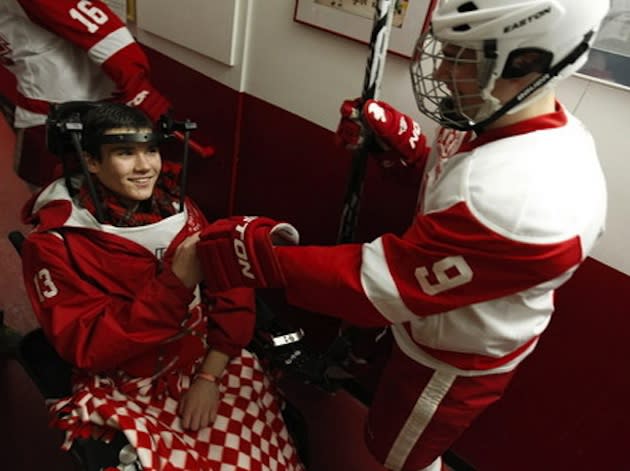 Paralyzed Benilde-St. Margaret's hockey player Jack Jablonski fist bumps a teammate — AP/The Star Tribune, Carlos Gonzalez