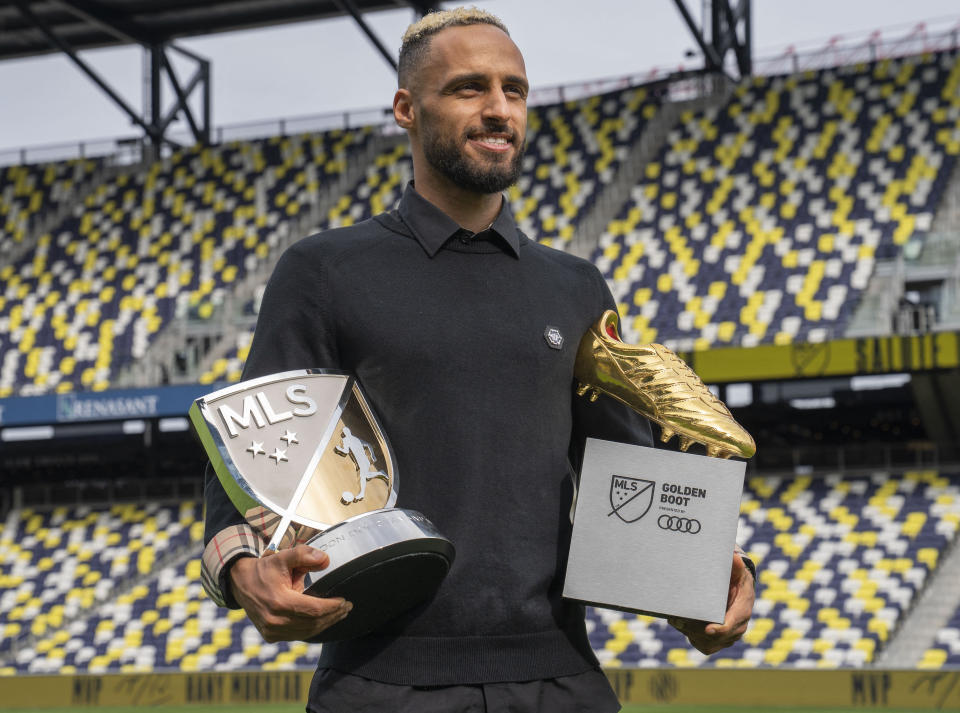 Nov 1, 2022; Nashville, Tennessee, USA;
Nashville SC&#39;s Hany Mukhtar holds his Landon Donovan MLS MVP and his MLS Golden Boot awards as he poses for a portrait at Geodis Park.  Mandatory Credit: George Walker IV - USA TODAY Sports