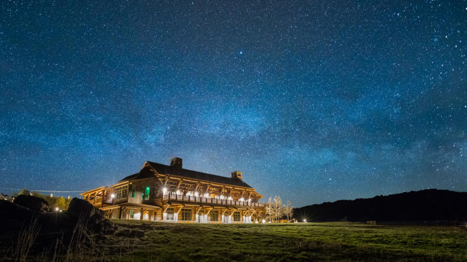 The lodge at night - Credit: Brush Creek Ranch