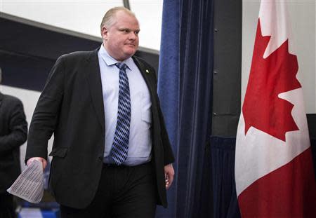 Toronto Mayor Rob Ford arrives to make a statement about his personal life and the Capital and Operating Budgets meeting that had just finished at City Hall in Toronto, January 22, 2014. REUTERS/Mark Blinch