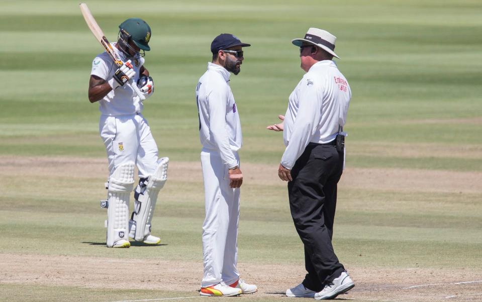 Indian captain Virat Kohli questions the decision of not out during the fourth day of the third and final test match between South Africa and India in Cape Town, South Africa, Friday, Jan. 14, 2022. - AP