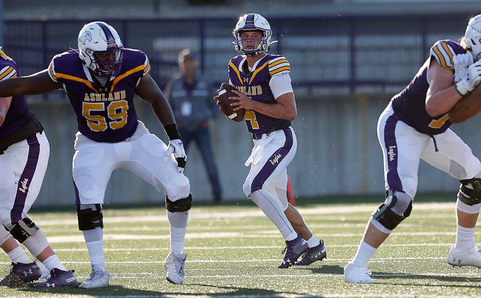 Ashland University's Austin Brenner (4) drops back to pass against Notre Dame College during college football action at Jack Miller Stadium, Thursday, Sept. 1, 2022. The two teams will meet again Saturday in the first round of the NCAA Division II playoffs. TOM E. PUSKAR/ASHLAND TIMES-GAZETTE