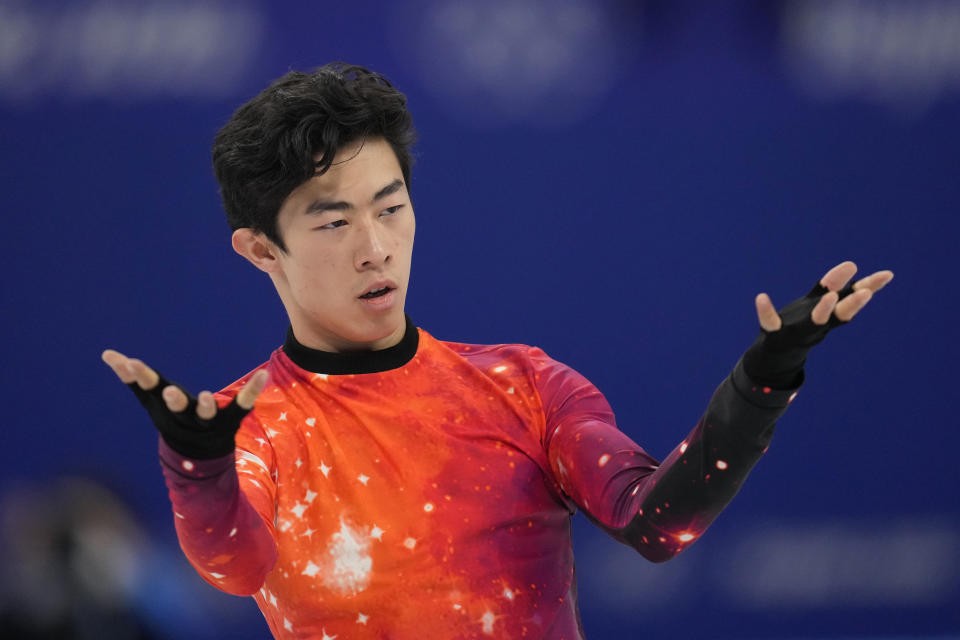 FILE - Nathan Chen competes in the men's free skate program during the figure skating event at the 2022 Winter Olympics, Thursday, Feb. 10, 2022, in Beijing. Eight months after finishing behind the Russians at the Winter Games, the U.S. team has yet to receive its medals, or even know whether they will be silver or gold. (AP Photo/Natacha Pisarenko, File)