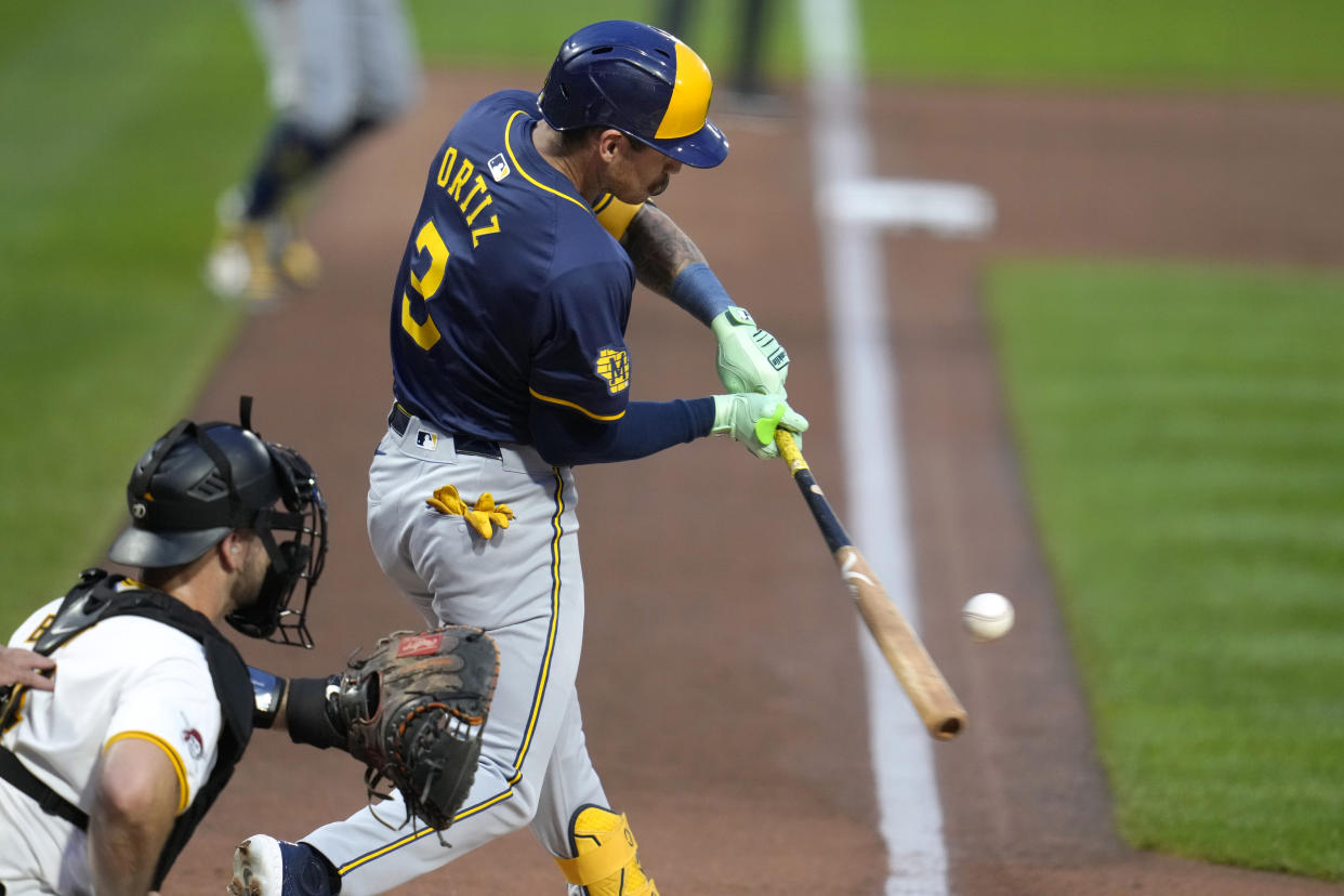 Milwaukee Brewers' Joey Ortiz (3) singles to centerfield off Pittsburgh Pirates starting pitcher Bailey Falter, driving in two runs, during the second inning of a baseball game in Pittsburgh, Tuesday, Sept. 24, 2024. (AP Photo/Gene J. Puskar)