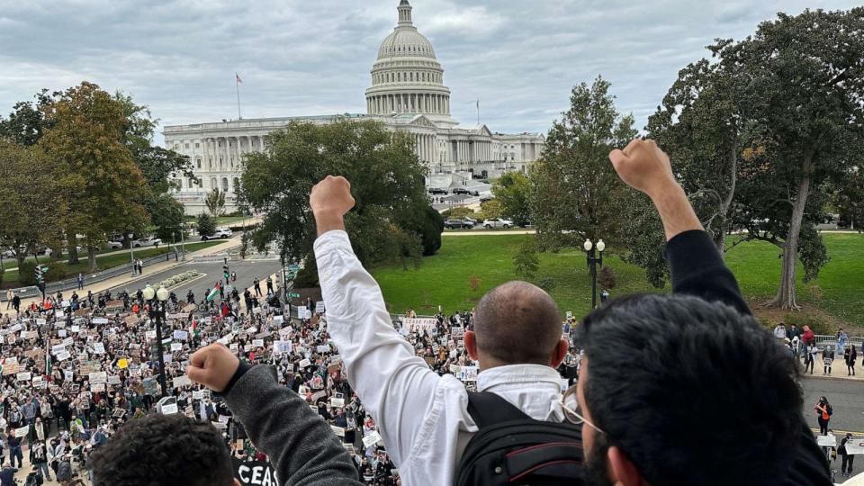 PHOTO: Protesters calling for a cease fire in Gaza and an end to the Israel-Hamas conflict demonstrate atop the steps of the Cannon House office building on Capitol Hill in Washington, Oct. 18, 2023. (Jonathan Ernst/Reuters)