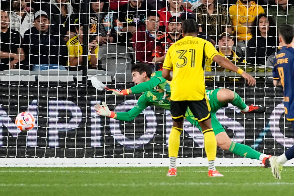 Apr 2, 2024; Columbus, OH, USA; Columbus Crew goalkeeper Patrick Schulte (28) dives but misses a shot from Tigres UANL forward Andre-Pierre Gignac (10) during the first half of the Concacaf Champions Cup quarterfinal at Lower.com Field. Mandatory Credit: Adam Cairns-USA TODAY Sports