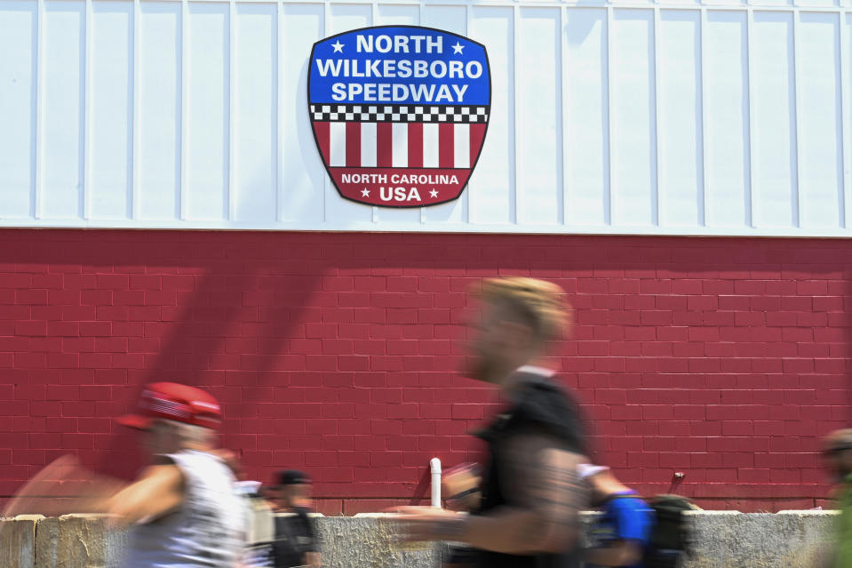 Fans arrive prior to the NASCAR All-Star Cup Series auto race at North Wilkesboro Speedway, Sunday, May 21, 2023, in North Wilkesboro, N.C. (AP Photo/Matt Kelley)