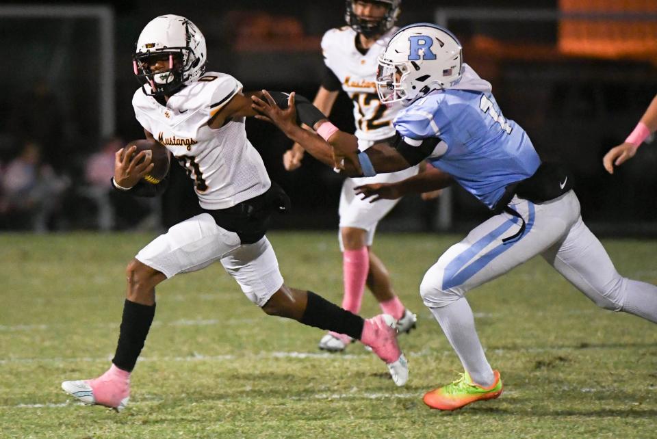 Chris Kelly of Merritt Island is chased by DJ McCormick of Rockledge during their game Friday, October 20, 2023. Craig Bailey/FLORIDA TODAY via USA TODAY NETWORK