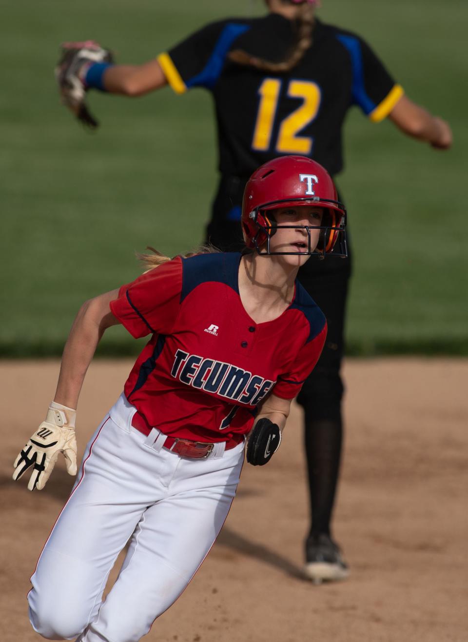 Tecumseh's Katelyn Marx (2) heads for third base against Castle during their game at Tecumseh High School Wednesday evening, May 10, 2023. Castle won the game 7-4 in extra innings.