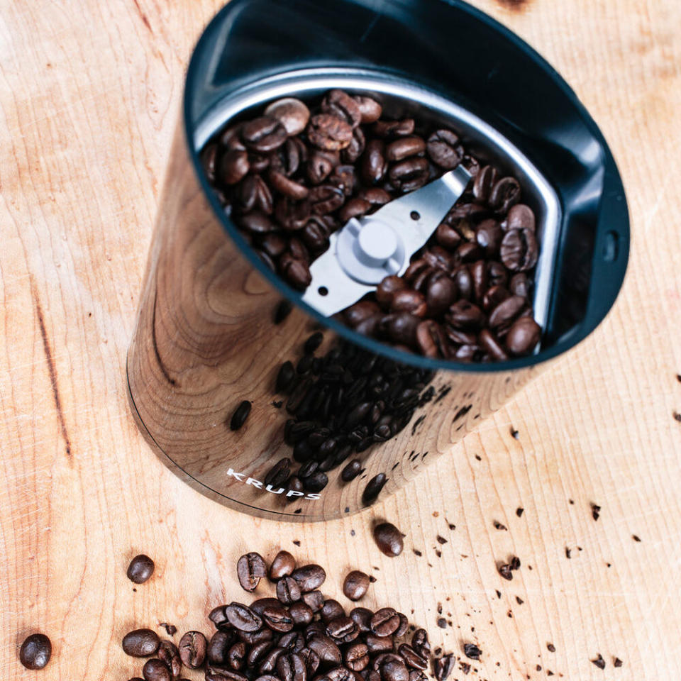 The coffee grinder grinding up beans