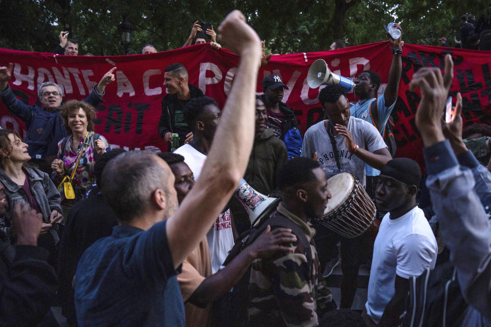 FILE - People celebrate at the Republique plaza after the second round of the legislative election, on July 7, 2024 in Paris. For many French voters of diverse backgrounds, last Sunday’s parliamentary election results were a relief, seemingly an embrace of the country’s ethnic heterogeneity instead of a victory for xenophobic far-right forces. (AP Photo/Louise Delmotte, File)