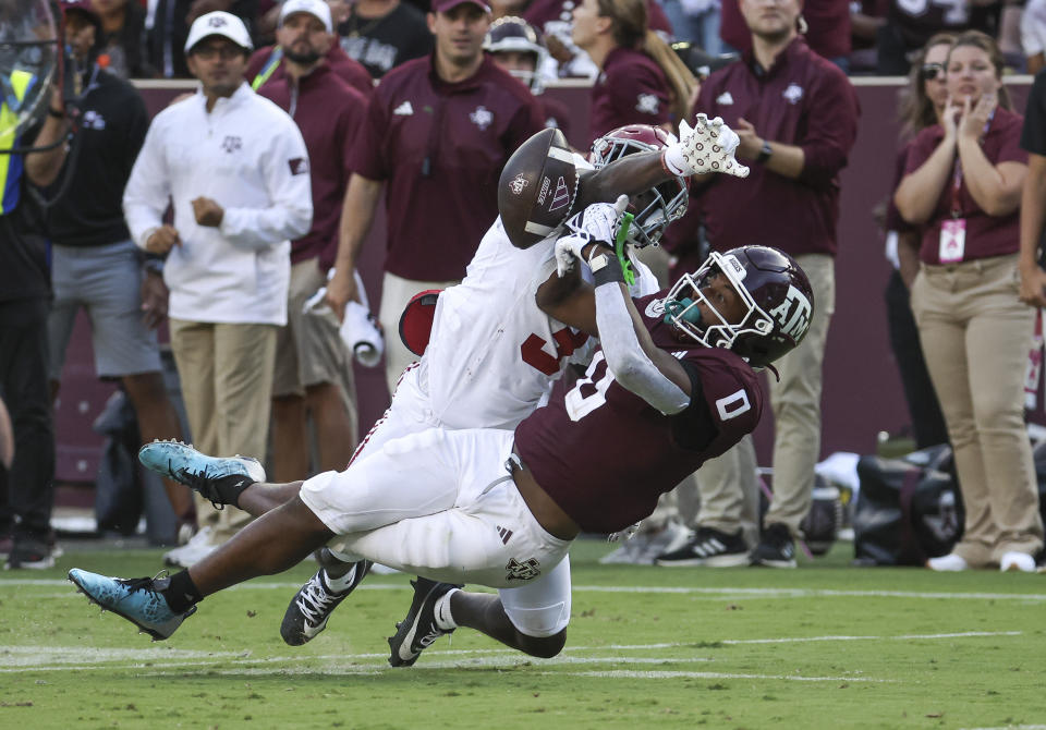 Oct 7, 2023; College Station, Texas; Texas A&M Aggies wide receiver Ainias Smith (0) is unable to make a reception as Alabama Crimson Tide defensive back Terrion Arnold (3) defends during the fourth quarter at Kyle Field. Troy Taormina-USA TODAY Sports