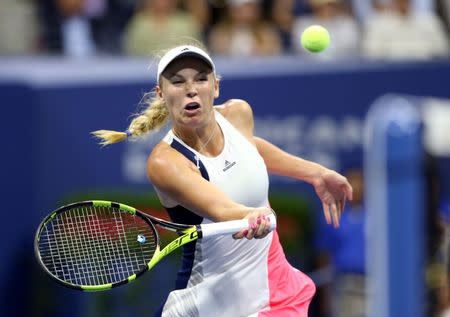 Sep 6, 2016; New York, NY, USA; Caroline Wozniacki of Denmark hits a shot to Anastasija Sevastova of Latvia on day nine of the 2016 U.S. Open tennis tournament at USTA Billie Jean King National Tennis Center. Jerry Lai-USA TODAY Sports