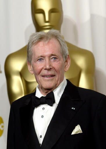 File photo shows veteran Irish stage and screen actor Peter O'Toole next to the Oscar statue after receiving an honorary Academy Award in 2003. He received eight Oscar nominations during a career that also included noted roles in 1979's "Caligula" and "The Last Emperor", but never won the top prize itself