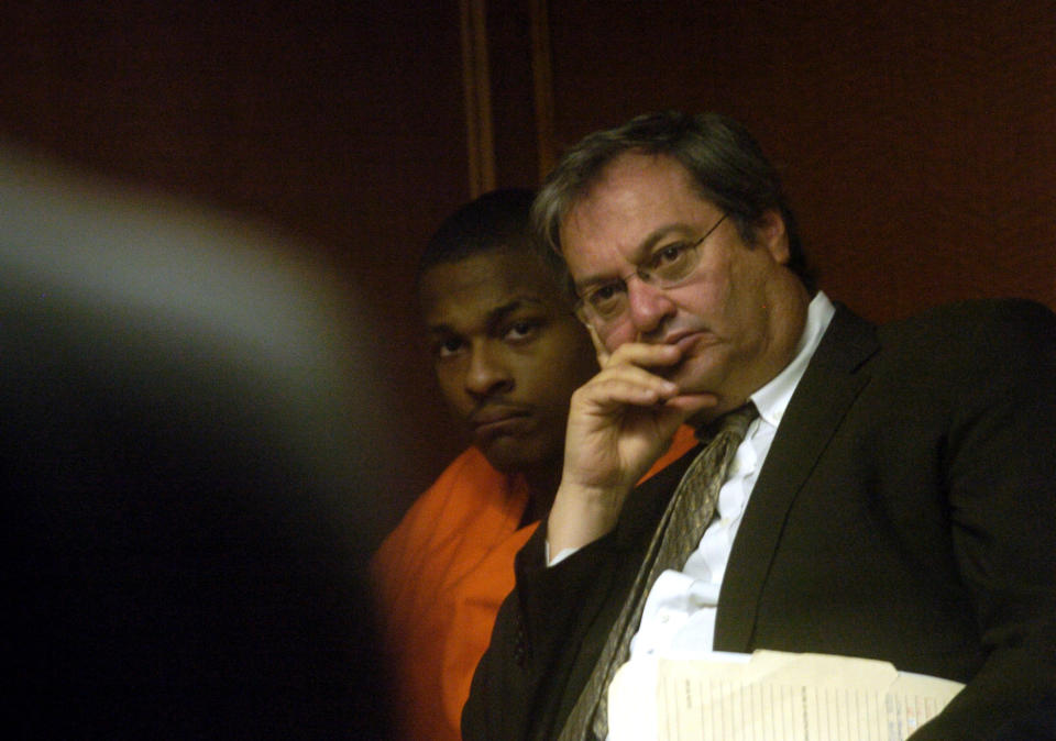 Robert Ray, center, listens after being indicted for double homicide at Arapahoe County Court on Monday March. 13, 2006. (Photo: RJ Sangosti via Getty Images)