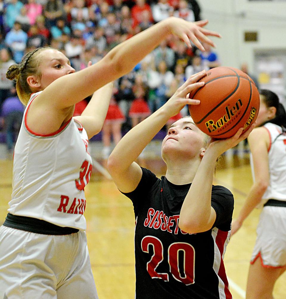 Sisseton's Ruby Rice (20) shoots against Wagner's Macy Koupal during their semifinal game in the state Class A high school girls basketball tournament on Friday, March 10, 2023 in the Watertown Civic Arena.