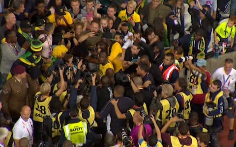 Bolt meets the Jamaicans in the crowd