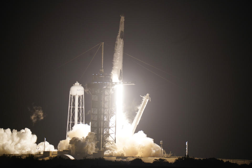 A SpaceX Falcon9 rocket, with the Crew Dragon capsule attached, lift's off from Kennedy Space Center's Launch Complex 39-A Sunday Nov. 15, 2020, in Cape Canaveral, Fla. Four astronauts are beginning a mission to the international Space Station. (AP Photo/John Raoux)